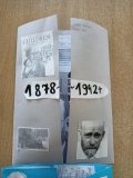 szary złożony lapbook z czarnobiałymi fotografiami Janusza Korczaka